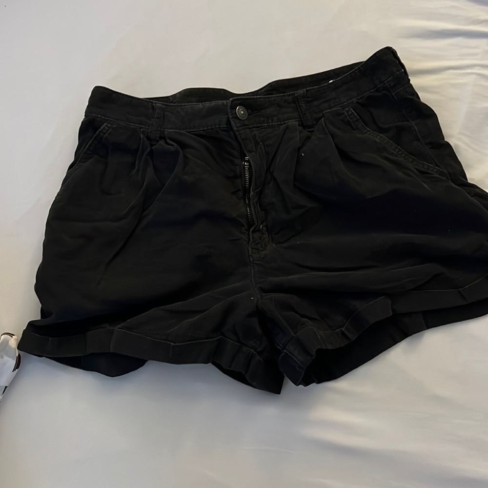 Black corduroy shorts. American Eagle size 12. True to size. Not stretchy